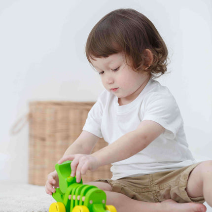 PlanToys Nachziehtier Krokodil Tanzendes Krokodil