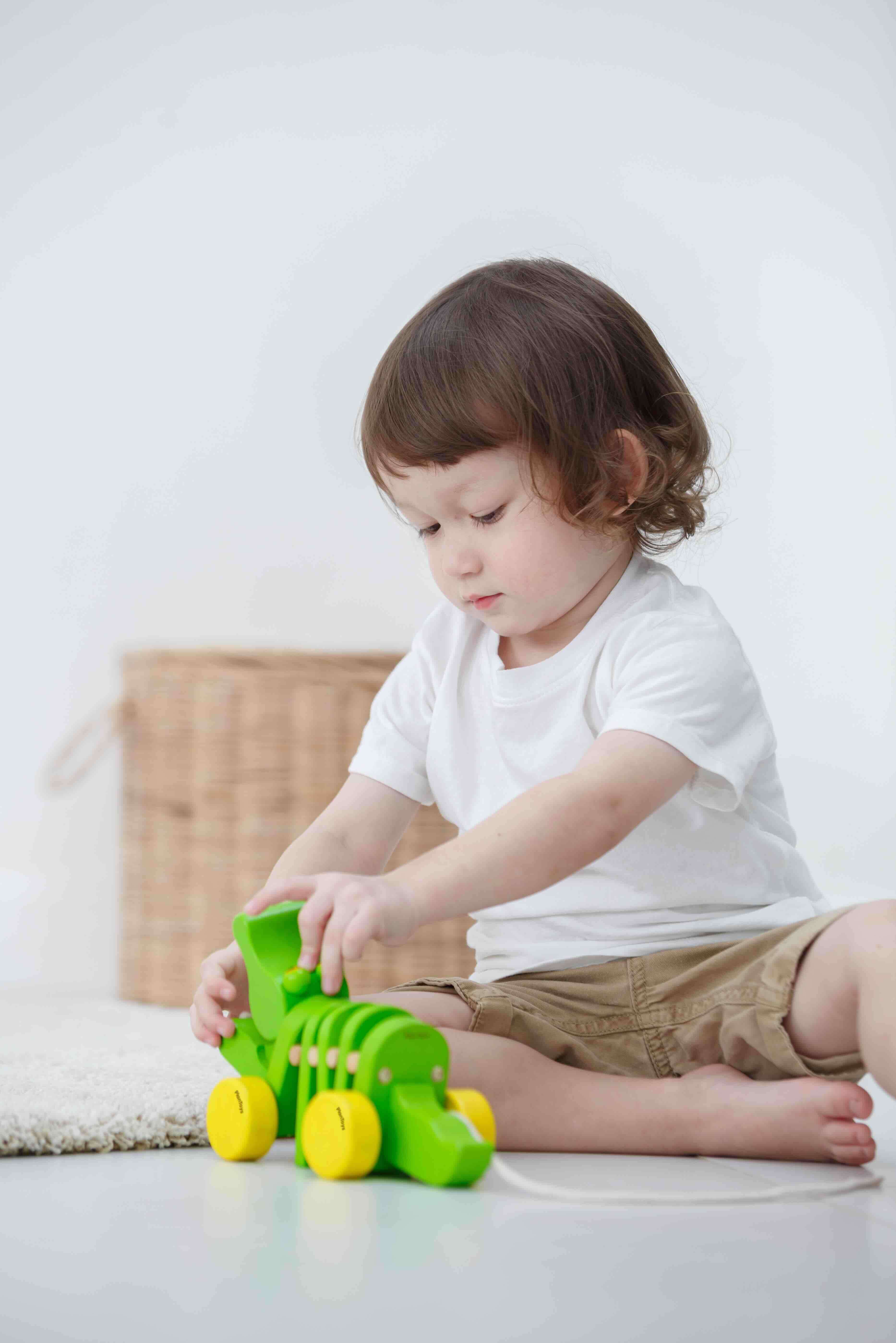 PlanToys Nachziehtier Krokodil Tanzendes Krokodil - Heldenspielzeug